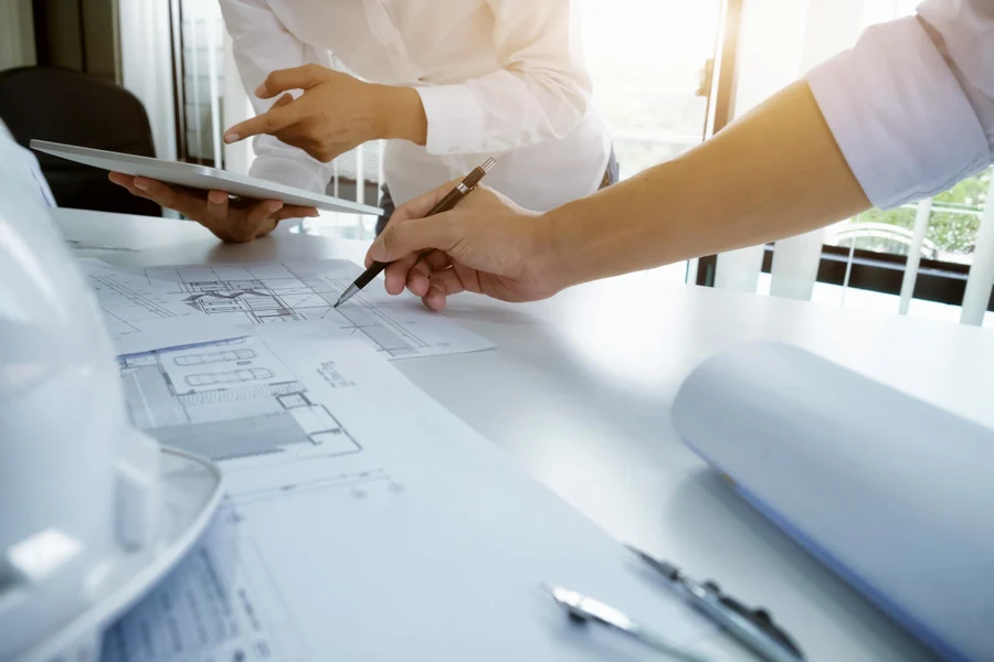 e3bb9a8c-60d7-4dff-bb18-7d71a158b3f6-engineer-meeting-architectural-project-working-with-partner.jpg